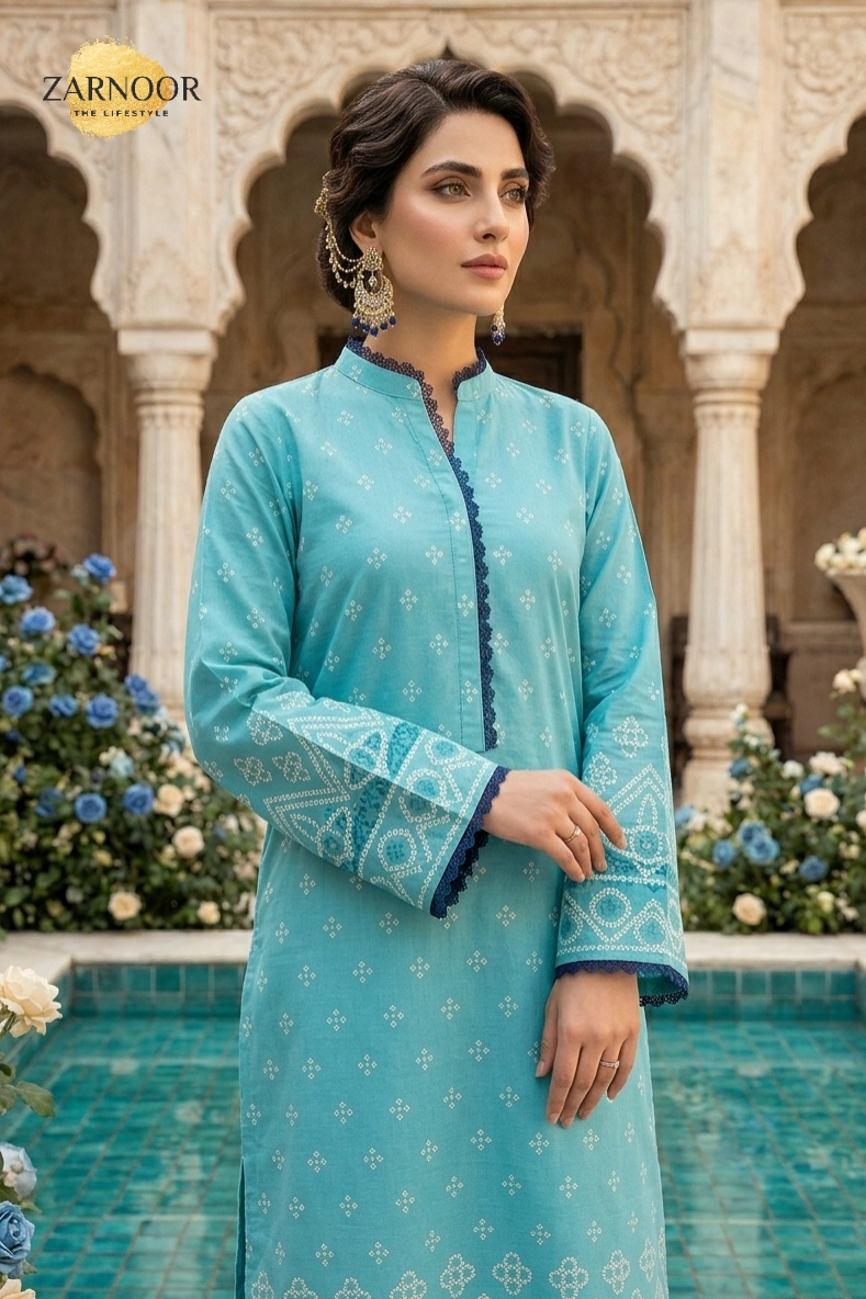 Woman wearing turquoise Chunri lawn 3-piece suit with contrast purple printed dupatta and matching trousers
